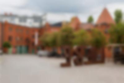 Inside the courtyard of the Kulturbrauerei, Berlin, 2021. The Museum in der Kulturbrauerei focuses exclusively on the history of former East Germany and features the permanent exhibition (link: https://www.hdg.de/en/museum-in-der-kulturbrauerei/exhibitions/everyday-life-in-the-gdr text: 