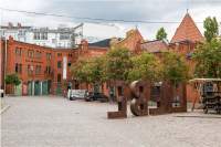 Inside the courtyard of the Kulturbrauerei, Berlin, 2021. The Museum in der Kulturbrauerei focuses exclusively on the history of former East Germany and features the permanent exhibition (link: https://www.hdg.de/en/museum-in-der-kulturbrauerei/exhibitions/everyday-life-in-the-gdr text: 