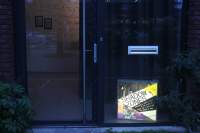 Exhibition installation view. Zone Collective (Kirila Cvetkovska and Megan Hoetger), *Shadow Zones: Experimental Cinema*
*History in Yugoslavia; or, a Cinema and*
*a History Made and Unmade by Maps*, When Site Lost the Plot, Amsterdam, July - October 2021. Photo: Quenton Miller, courtesy of When Site Lost the Plot.